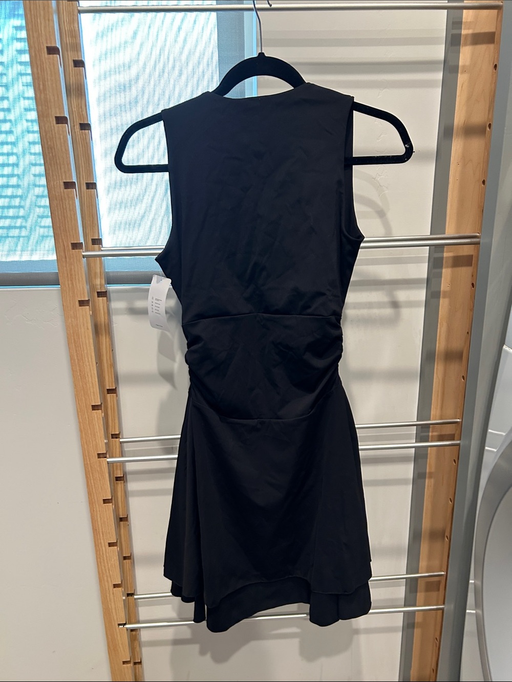 Classic Black Sleeveless Mini Dress with Flared Hem